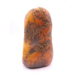 A soapstone seal. 10 cm high.