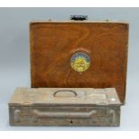 A military tin box and a boxed Duplicator. The latter 56 cm wide.