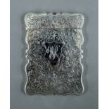 A silver card case. 10 cm high. 74.9 grammes.