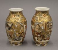 A pair of Japanese Satsuma vases. 12 cm high.