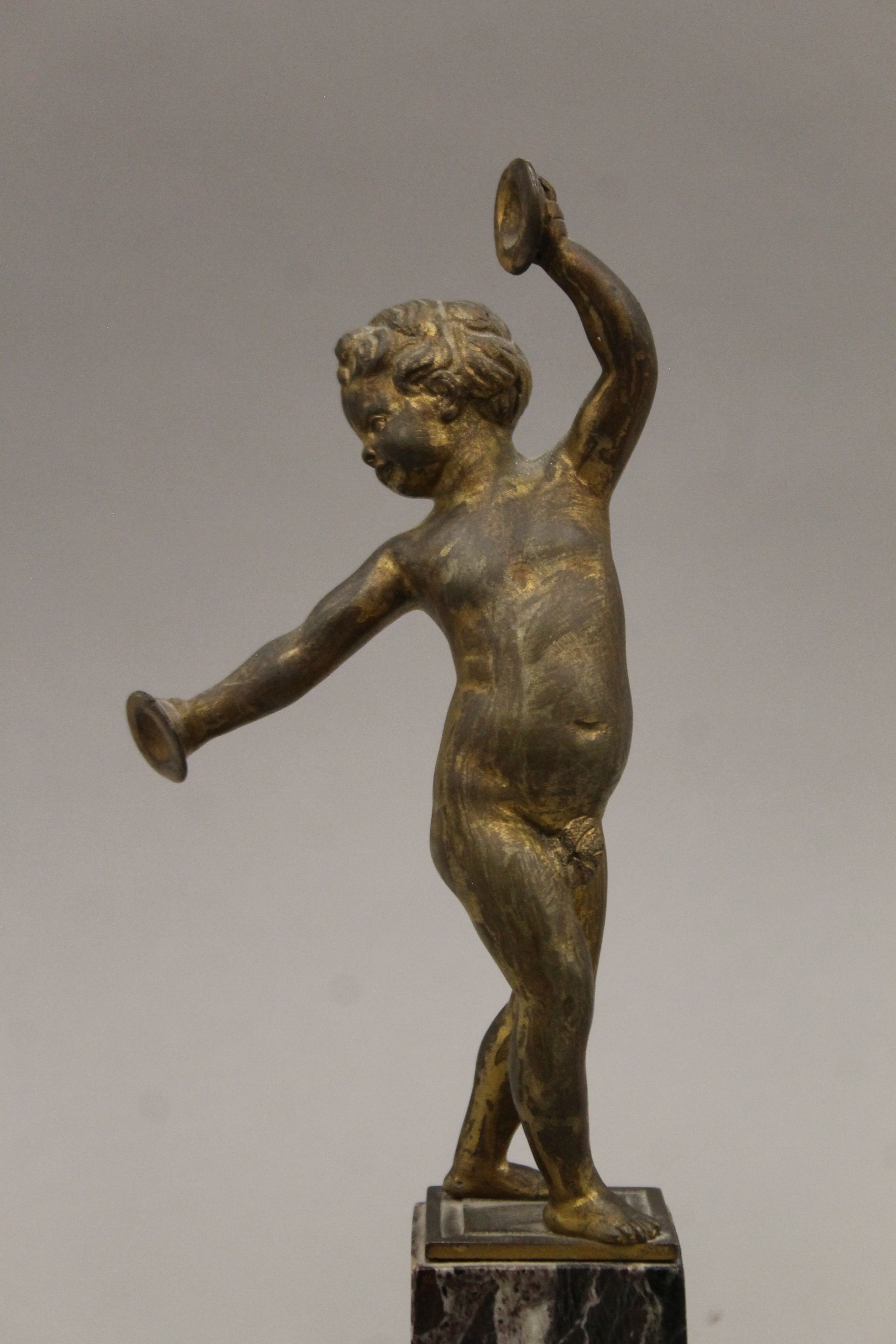 A pair of bronze putto, on marble bases. The largest 27 cm high. - Image 3 of 7