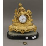 A 19th century ormolu clock and stand. 37 cm high.