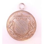 A Shanghai Jubilee medal awarded to Douglas Jones, November 17, 1893. 3.5 cm diameter.
