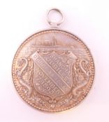 A Shanghai Jubilee medal awarded to Douglas Jones, November 17, 1893. 3.5 cm diameter.