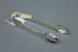 A pair of Victorian silver sugar tongs. 15 cm long. 72.9 grammes.