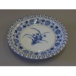 A Chinese blue and white porcelain dish. 32 cm diameter.