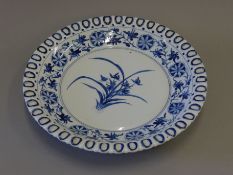 A Chinese blue and white porcelain dish. 32 cm diameter.
