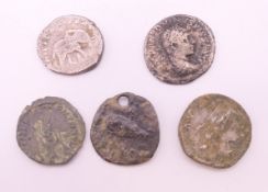 Five silver denarius, one with an elephant on the reverse. Largest approximately 1.75 cm diameter.