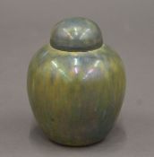 A small Ruskin pottery lustre glazed ginger jar, the underside dated 1927. 10 cm high.