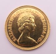 A 1982 gold half sovereign.