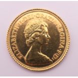 A 1982 gold half sovereign.