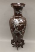 A large Chinese mother-of-pearl inlaid vase, on stand. 99.5 cm high overall.