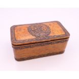 A finely carved early 19th century burr wood table snuff box,