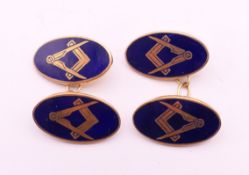 A pair of Masonic 9 ct gold and blue enamel cufflinks. 8.6 grammes total weight.