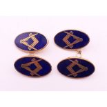 A pair of Masonic 9 ct gold and blue enamel cufflinks. 8.6 grammes total weight.