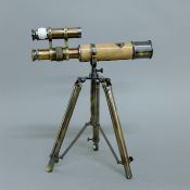 A small telescope on stand. 25 cm long.