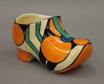 A Bizarre by Clarice Cliff porcelain shoe form vase. 14 cm long.