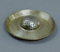 A silver golf trophy dish. 10 cm diameter. 87.3 grammes.