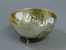 A Greek 900 silver bowl with repousse decoration. 12 cm diameter. 128.3 grammes.