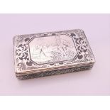 A niello decorated unmarked silver snuff box. 6.5 cm wide. 51.3 grammes.