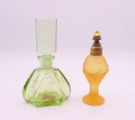Two Art Deco glass scent bottles with stoppers. Largest 9.5 cm high.