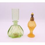 Two Art Deco glass scent bottles with stoppers. Largest 9.5 cm high.