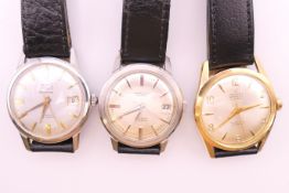 Three gentleman's wristwatches: Lauris, Excalibur and Allaine.