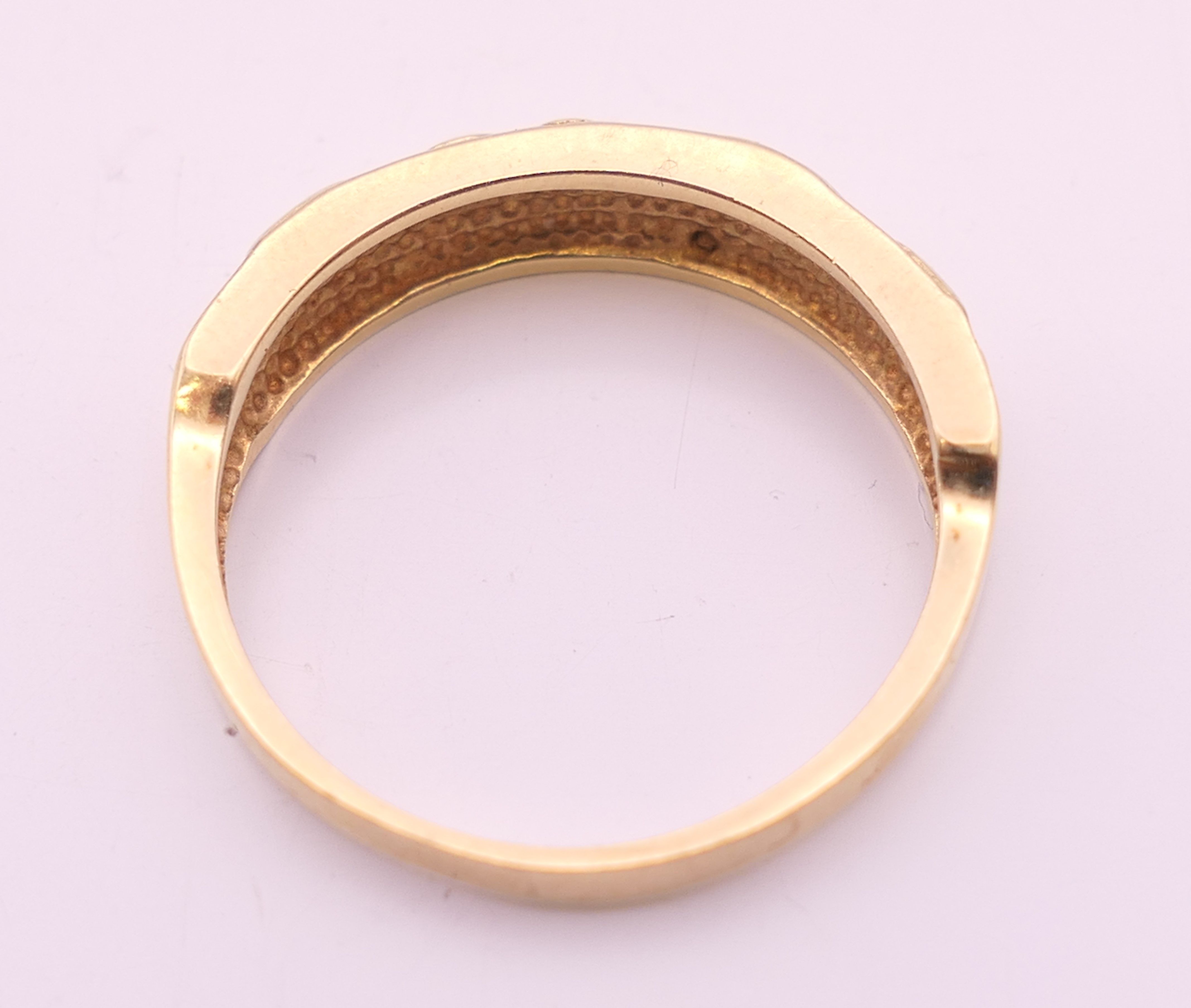 A 9 ct gold ring. Ring size Q/R. 3.8 grammes total weight. - Image 3 of 6