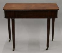 A late 19th/early 20th century mahogany side table, with lift up lid,