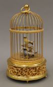 A 20th century Swiss double singing bird cage automaton made by Reuge Music Switzerland.