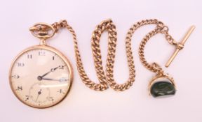 A 9 ct gold open face pocket watch on 9 ct gold chain with fob. The watch 4.5 cm diameter.