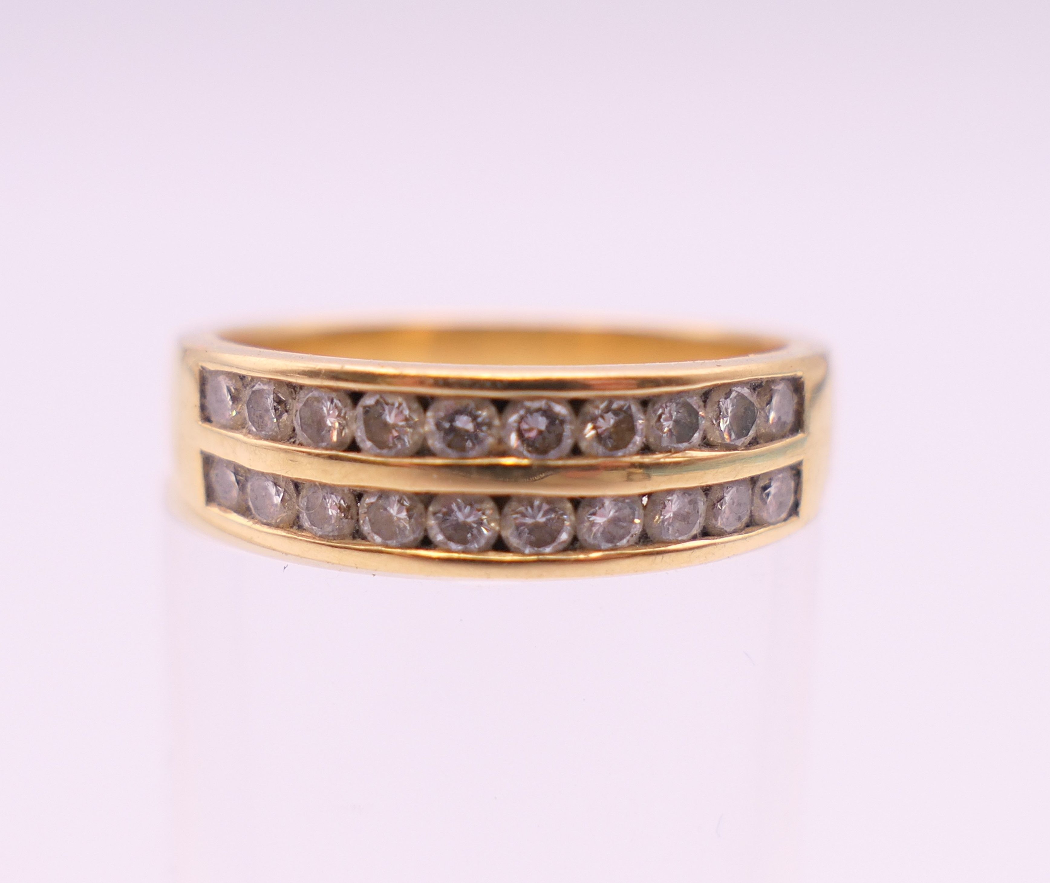 An 18 ct gold diamond ring. Ring size M. 4.4 grammes total weight. - Image 2 of 7
