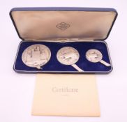 A Britannia silver proof three coin set, Prince of Wales Investiture 1969, boxed with certificate.