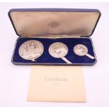 A Britannia silver proof three coin set, Prince of Wales Investiture 1969, boxed with certificate.