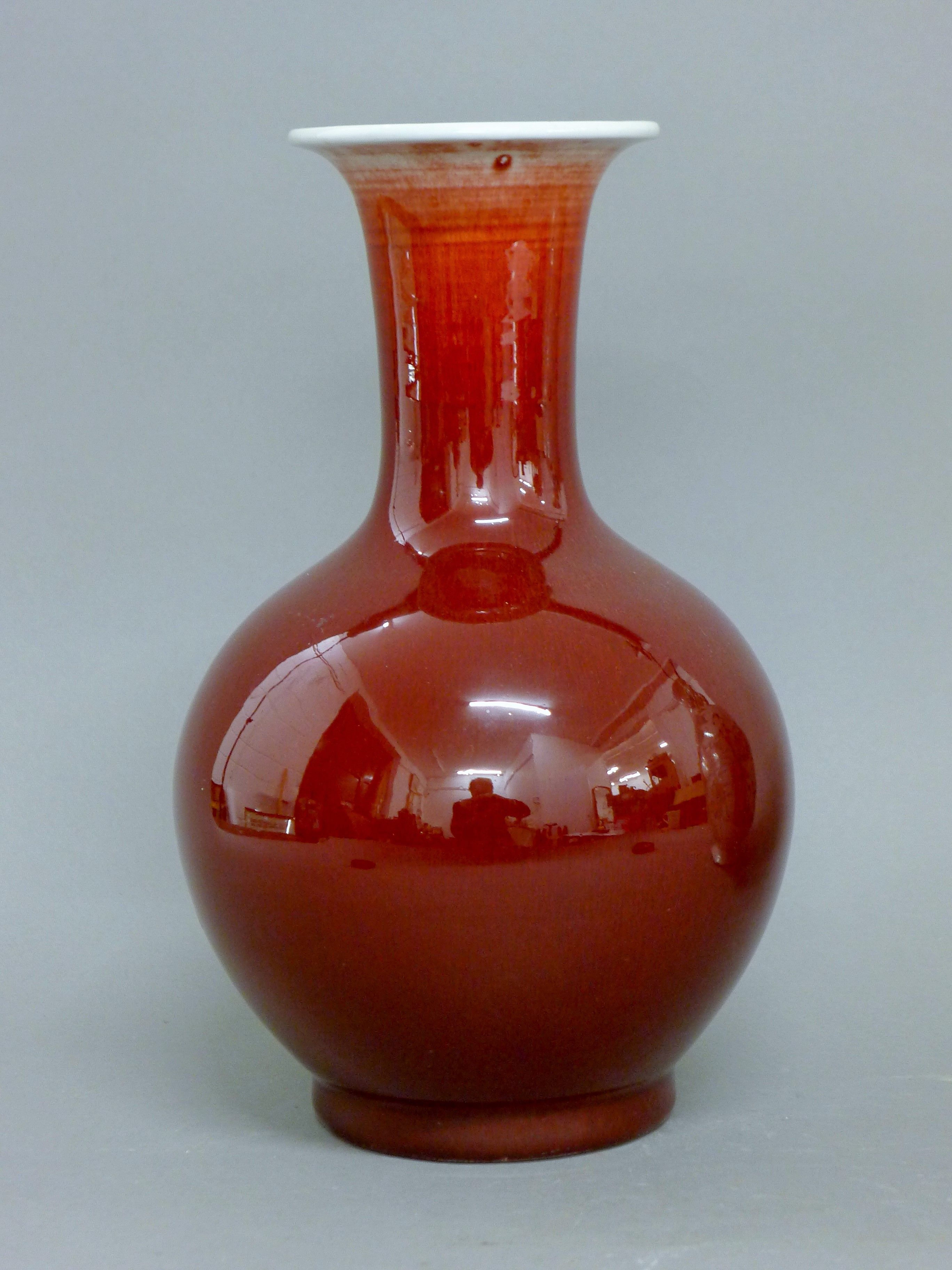 A Chinese sang de boeuf porcelain vase. 30 cm high. - Image 2 of 5