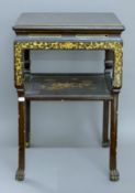 A Chinese lacquered two tier side table. 43 cm wide.