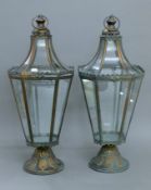 A pair of octagonal lanterns. 75 cm high.