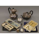 A silver plated three piece tea set and a quantity of plated cutlery.