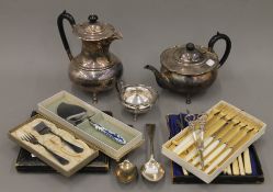 A silver plated three piece tea set and a quantity of plated cutlery.