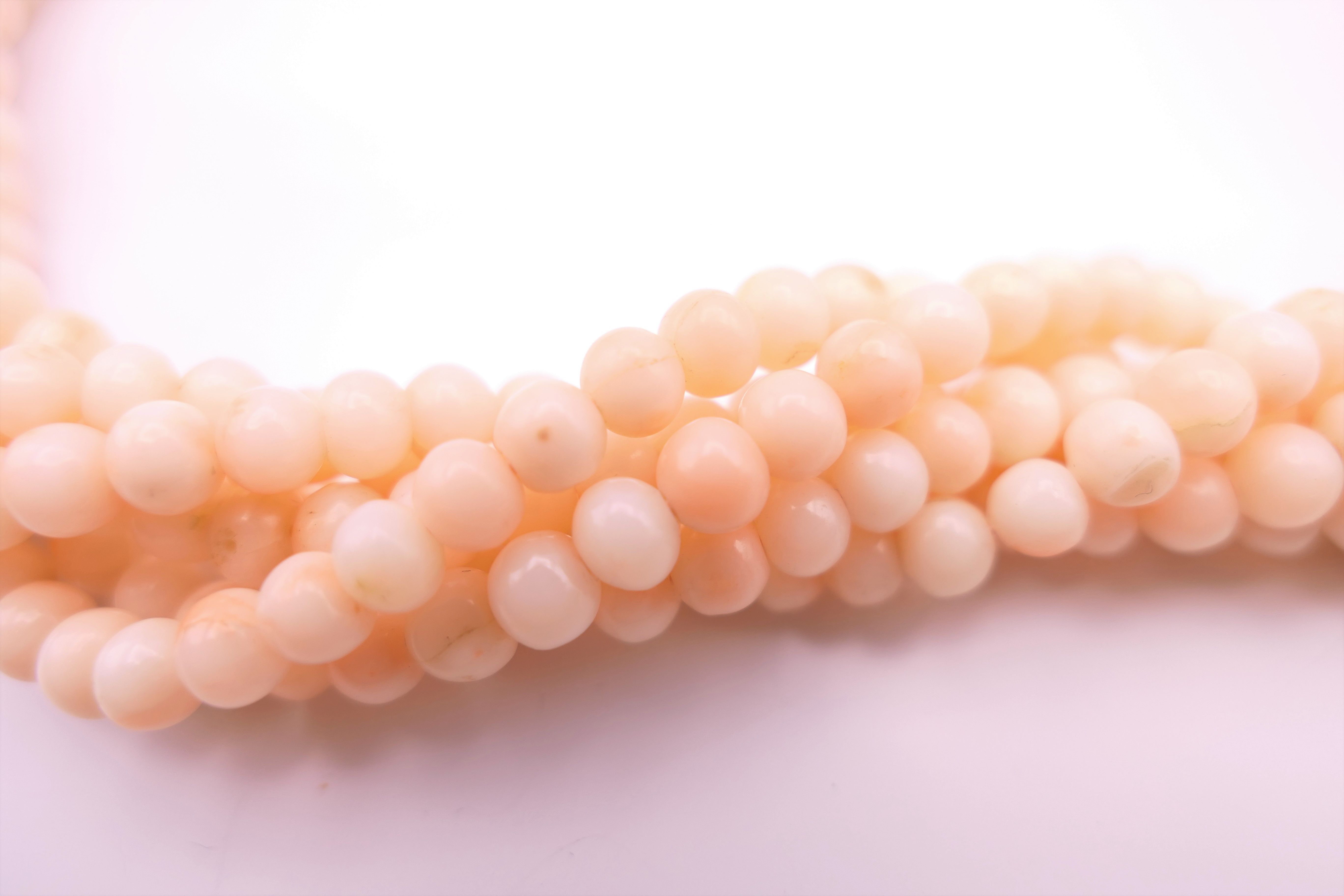 A six strand pearl necklace with an 18 ct gold clasp. 50 cm long. - Image 6 of 6