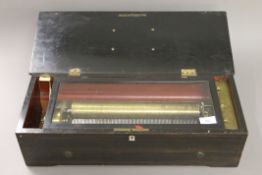 A 19th century music box. 56 cm wide.