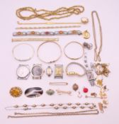 A quantity of costume jewellery, including silver and wristwatches.