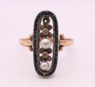 A Victorian 9 ct gold seed pearl dress ring. Ring size N. 3.6 grammes total weight.