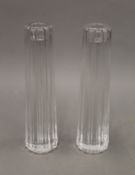 A pair of Tiffany & Co glass candlesticks. 20.5 cm high.