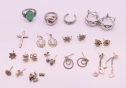 A bag of silver jewellery items.