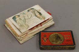 A quantity of Victorian ephemera, including various cards and a Victorian Boer War tin, etc.