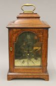 An 18th century mahogany bracket clock, the brass dial inscribed 'John Rowning Newmarket'.