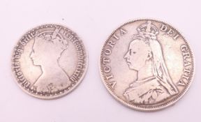 Two Victorian silver coins.