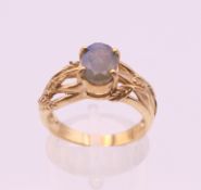 A 9 ct gold dress ring. Ring size N. 3.7 grammes total weight.