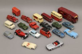 A box of various Die Cast toys, including Dinky, Charbens, etc.
